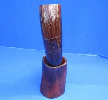14 to 18 inches Dyed Reddish Brown Cow Horns Carved, Engraved with Lines and Letters. Each comes with a horn stand.   <font color=red> Wholesale</font> - 8 @ $15.95 each <font color=red> CLOSEOUT 10 @ $9.00 EACH</FONT>