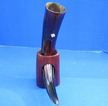 14 to 18 inches Dyed Reddish Brown Cow Horns Carved, Engraved with Lines and Letters. Each comes with a horn stand.   <font color=red> Wholesale</font> - 8 @ $15.95 each <font color=red> CLOSEOUT 10 @ $9.00 EACH</FONT>