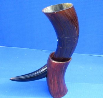 14 to 18 inches Dyed Reddish Brown Cow Horns Carved, Engraved with Lines and Letters. Each comes with a horn stand.   <font color=red> Wholesale</font> - 8 @ $15.95 each <font color=red> CLOSEOUT 10 @ $9.00 EACH</FONT>